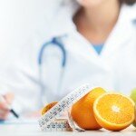 Nutritionist Doctor is writing a prescription. Focus on fruit